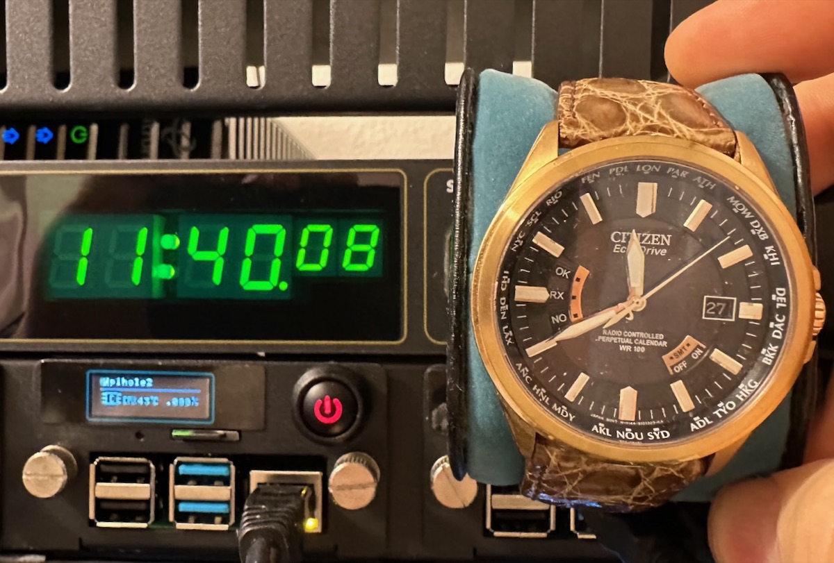 Analog and atomic clocks in sync